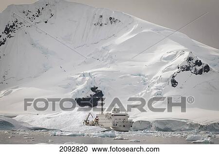 A Ship In The Water Along The Coast; Antarctica View Large Photo Image Stock Image - A Ship In The Water Along The Coast; Antarctica. Fotosearch