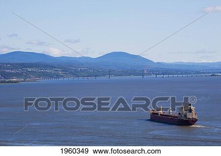 Stock Photo - A Ship On The St. Lawrence River; Quebec City, Quebec, Canada. Fotosearch