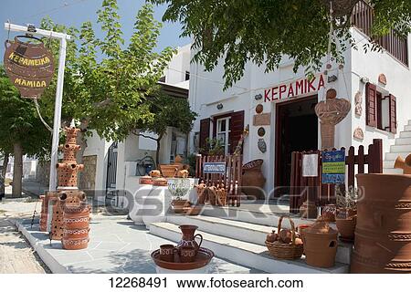 A shop selling local pottery on the island of Sifnos; Sifnos, Cyclades, Greek Islands, Greece View Large Photo Image Stock Image - A shop selling local pottery on the island of Sifnos; Sifnos, Cyclades, Greek Islands, Greece. Fotosearch