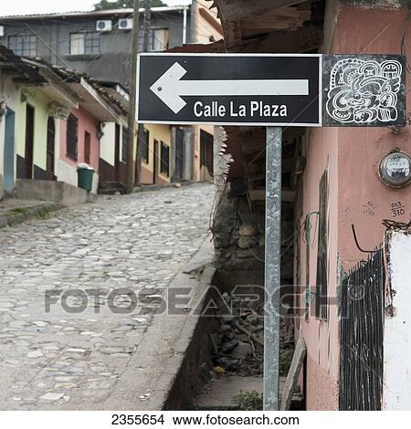 Picture - A Sign Along A Street For Calle La Plaza; Copan, Honduras. Fotosearch