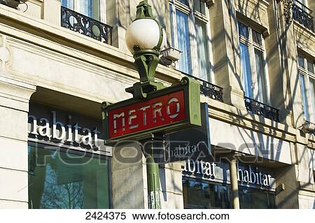 A sign for the Metro outside a retail building; Paris, France View Large Photo Image Stock Photography - A sign for the Metro outside a retail building; Paris, France. Fotosearch