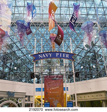 A Sign For The Navy Pier With Banner Hanging Overhead; Chicago Illinois United States Of America View Large Photo Image Stock Image - A Sign For The Navy Pier With Banner Hanging Overhead; Chicago Illinois United States Of America. Fotosearch