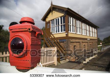 Stock Photo - A signal light on the train tracks; Wansford, Peterborough, England. Fotosearch