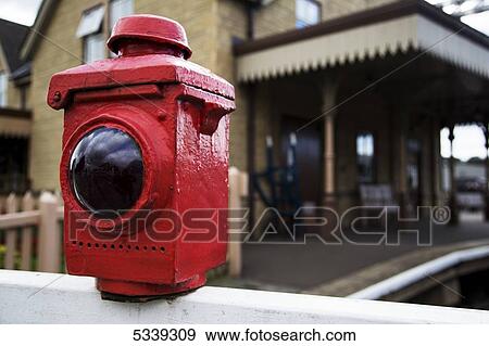 Stock Photo - A signal light on the train tracks; Wansford, Peterborough, England. Fotosearch