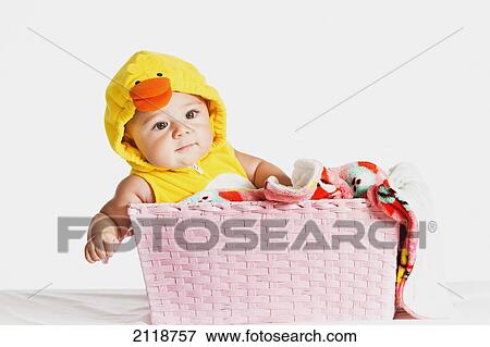 Stock Photo - A Six-Month-Old Girl In A Duck Halloween Costume; Fountain Valley California Usa. Fotosearch