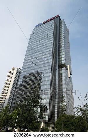 Picture - A Skyscraper Reflecting Another Building In The Glass Wall; Beijing, China. Fotosearch