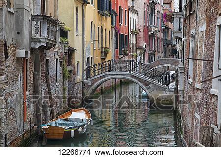 A small canal with a boat and bridge; Venice, Italy View Large Photo Image Picture - A small canal with a boat and bridge; Venice, Italy. Fotosearch