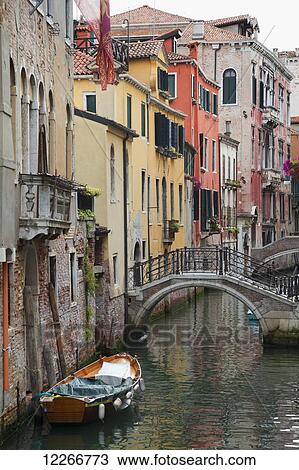 A small canal with a boat and bridge; Venice, Italy View Large Photo Image Stock Image - A small canal with a boat and bridge; Venice, Italy. Fotosearch
