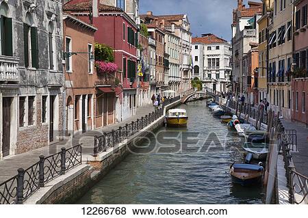 A small canal with boats; Venice, Italy View Large Photo Image Stock Photo - A small canal with boats; Venice, Italy. Fotosearch