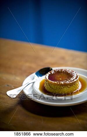 Stock Photograph - A Small Plate Of Flan. Fotosearch
