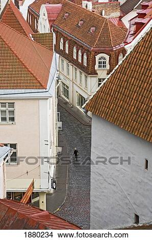 A Solitary Figure Walking The Cobbled Streets Of Tallinn, Aerial View View Large Photo Image Picture - A Solitary Figure Walking The Cobbled Streets Of Tallinn, Aerial View. Fotosearch