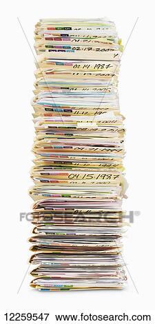 Stock Photo - A stack of old files on a white background. Fotosearch
