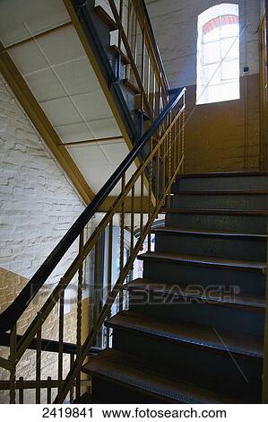 A stairway with a handrail inside a building; Hamburg, Germany View Large Photo Image Stock Image - A stairway with a handrail inside a building; Hamburg, Germany. Fotosearch