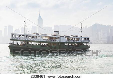 A Star Ferry Crossing Victoria Harbour; Hong Kong, China View Large Photo Image Stock Image - A Star Ferry Crossing Victoria Harbour; Hong Kong, China. Fotosearch