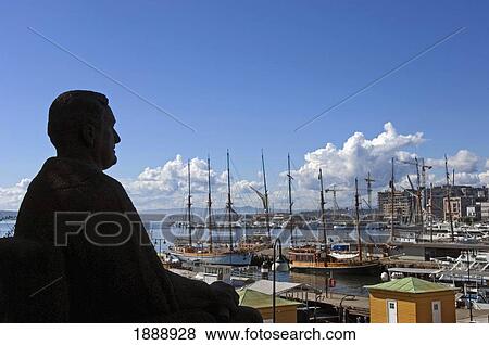 Stock Photo - A Statue Of A Man Looks Over The View Of Oslo Harbor. Fotosearch
