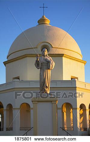 A Statue Of Jesus In Front Of A Church Building; Chiclana De La Frontera, Andalusia, Spain View Large Photo Image Stock Image - A Statue Of Jesus In Front Of A Church Building; Chiclana De La Frontera, Andalusia, Spain. Fotosearch