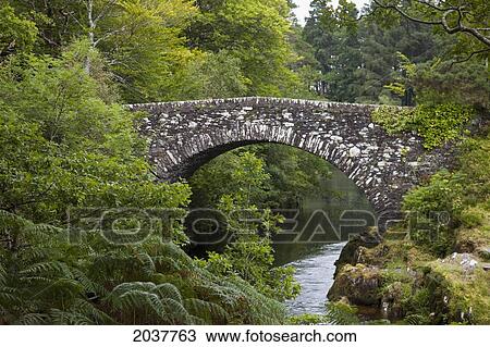 A Stone Bridge Crossing A River; Argyl Scotland View Large Photo Image Stock Image - A Stone Bridge Crossing A River; Argyl Scotland. Fotosearch
