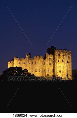 Picture - A Stone Building Illuminated At Night. Fotosearch
