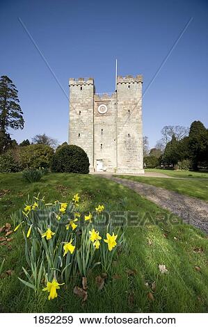 Stock Photo - A Stone Building With A Clock. Fotosearch