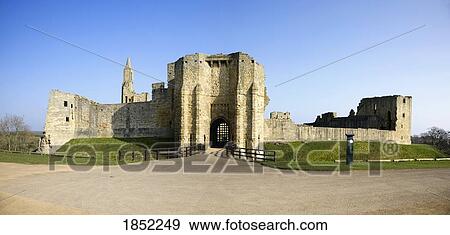 Stock Photo - A Stone Building With Bridge And Gate; Northumberland, England. Fotosearch