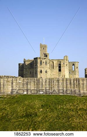 Stock Image - A Stone Building With Walls. Fotosearch