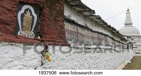 Stock Photograph - A Stone Wall And The Chendebji Chorten; Bhutan. Fotosearch