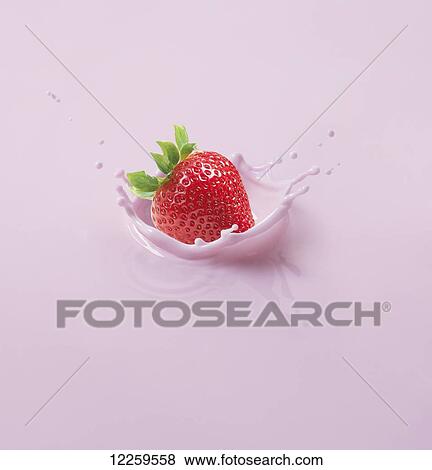 A strawberry splashing into pink liquid View Large Photo Image Stock Photo - A strawberry splashing into pink liquid. Fotosearch