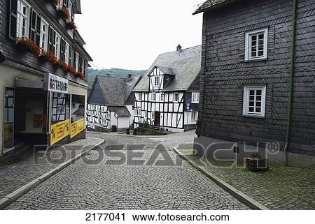 Stock Image - A Street Lined With Residential Buildings; Germany. Fotosearch