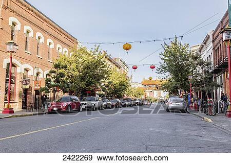 A street view of Chinatown with paper lanterns hanging above the street; Victoria, Vancouver Island, British Columbia View Large Photo Image Stock Photo - A street view of Chinatown with paper lanterns hanging above the street; Victoria, Vancouver Island, British Columbia. Fotosearch