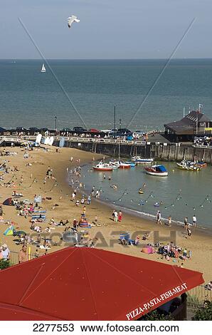 A summer's day view of Viking Bay; Broadstairs, Kent, England View Large Photo Image Stock Image - A summer's day view of Viking Bay; Broadstairs, Kent, England. Fotosearch