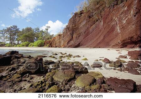 Stock Photograph - A sunny view of Koki Beach on a calm day.. Fotosearch