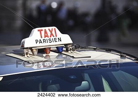 A taxi sign; Paris, France View Large Photo Image Stock Image - A taxi sign; Paris, France. Fotosearch