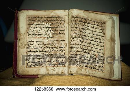 Stock Photo - A tiny Koran at Brunei's Dar al-Salam's Islamic Museum; Bandar Seri Begawan, Brunei. Fotosearch