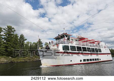 A tour boat on the river; Ottawa, Ontario, Canada View Large Photo Image Stock Image - A tour boat on the river; Ottawa, Ontario, Canada. Fotosearch