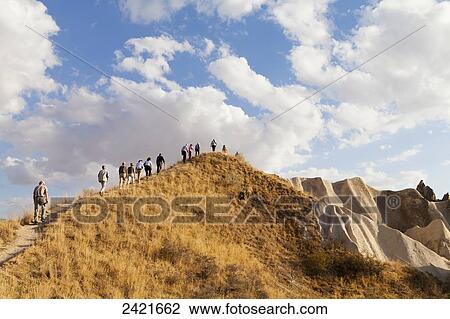 A tour group hikes up a sloped trail in Rose Valley; Cappadocia, Turkey View Large Photo Image Stock Image - A tour group hikes up a sloped trail in Rose Valley; Cappadocia, Turkey. Fotosearch