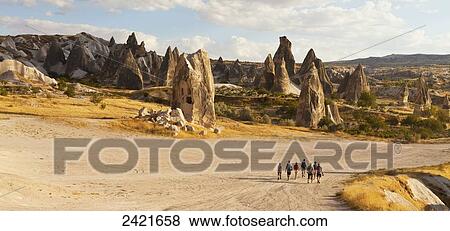 A tour group walks down a road in Rose Valley; Cappadocia, Turkey View Large Photo Image Stock Photo - A tour group walks down a road in Rose Valley; Cappadocia, Turkey. Fotosearch