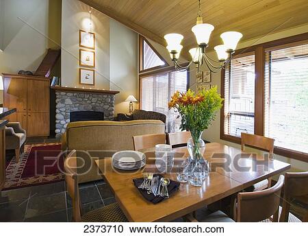A Townhome Features A River Rock Fireplace And High Cathedral Ceilings; Whistler, British Columbia, Canada View Large Photo Image Stock Image - A Townhome Features A River Rock Fireplace And High Cathedral Ceilings; Whistler, British Columbia, Canada. Fotosearch
