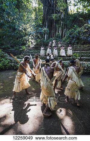 Stock Photo - A traditional dance group; Tanna Island, Vanuatu. Fotosearch