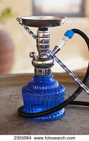 Picture - A traditional shisha; Liwa Oasis, Abu Dhabi, United Arab Emirates. Fotosearch