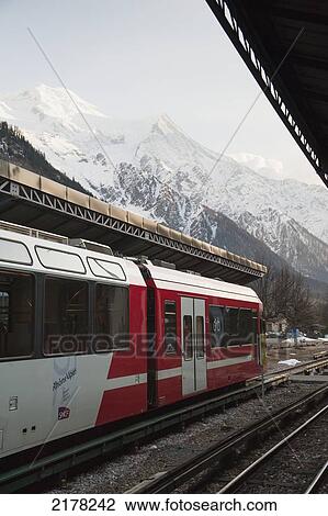 A Train On The Tracks In The Train Station; Chamonix-Mont-Blanc Rhone-Alpes France View Large Photo Image Stock Image - A Train On The Tracks In The Train Station; Chamonix-Mont-Blanc Rhone-Alpes France. Fotosearch