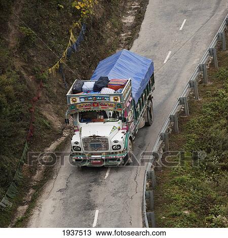 A Truck Covered With A Tarp Traveling On A Road; Thimphu District Bhutan View Large Photo Image Stock Image - A Truck Covered With A Tarp Traveling On A Road; Thimphu District Bhutan. Fotosearch