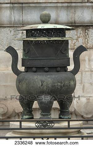Stock Photo - A Uniquely Shaped Metal Decorative Object; Beijing, China. Fotosearch