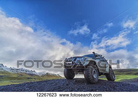 A vehicle known as a Super Jeep sits atop a little rise in the central Highlands; Iceland View Large Photo Image Stock Image - A vehicle known as a Super Jeep sits atop a little rise in the central Highlands; Iceland. Fotosearch