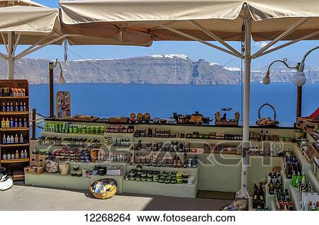 A vendor's shop displaying cosmetics and oils; Oia, Santorini, Cyclades, Greece View Large Photo Image Picture - A vendor's shop displaying cosmetics and oils; Oia, Santorini, Cyclades, Greece. Fotosearch