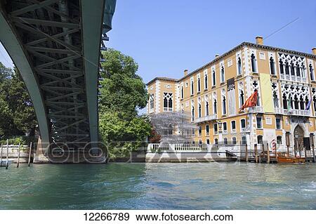Stock Photo - A view of the Art Institute from under the Accademia Bridge; Venice, Italy. Fotosearch