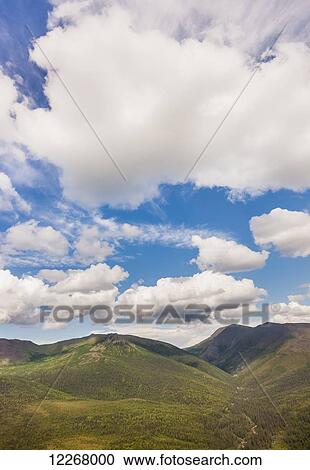 Stock Image - A view of the Baird Mountains and tundra covered hills, Shungnak, Arctic Alaska, summer. Fotosearch