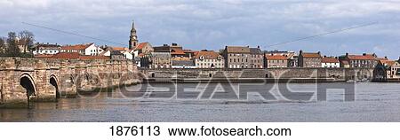 Stock Image - A View Of The City Along The Waterfront; Berwick-Upon-Tweed, Northumberland, England. Fotosearch
