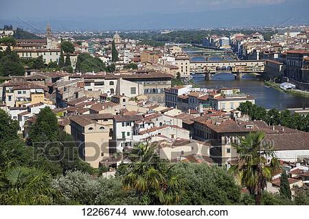 A view of the city with Ponte Vecchio; Florence, Italy View Large Photo Image Picture - A view of the city with Ponte Vecchio; Florence, Italy. Fotosearch