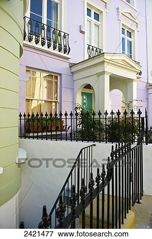 Stock Photo - A violet residential building with white trim, Primrose Hill; London, England. Fotosearch