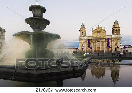 A Water Fountain In A Pond Outside The Cathedral Of Guatemala City; Guatemala City Guatemala View Large Photo Image Stock Photo - A Water Fountain In A Pond Outside The Cathedral Of Guatemala City; Guatemala City Guatemala. Fotosearch